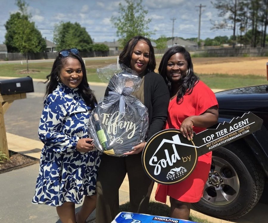 Catelyn Briggs celebrating a closing with her clients